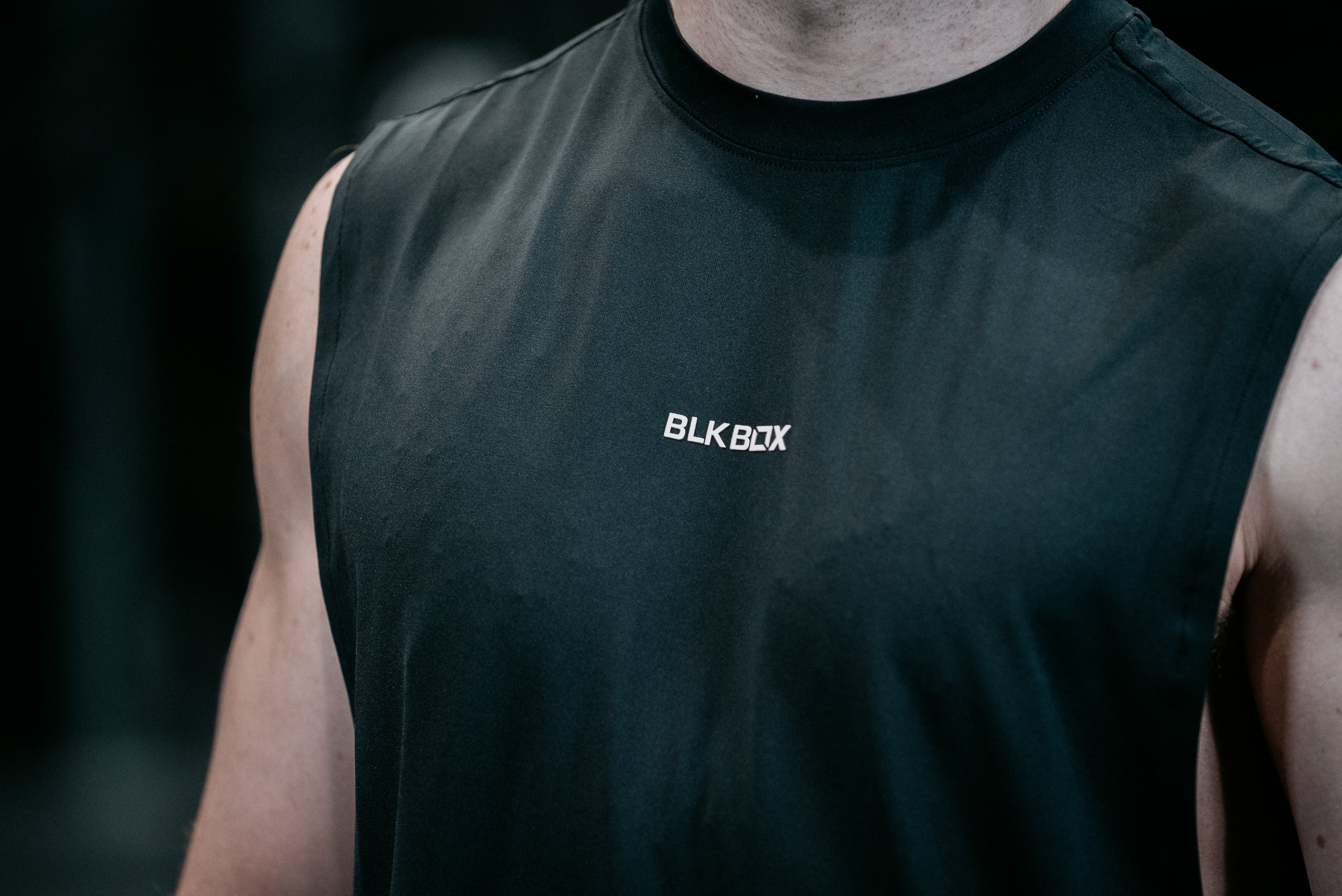 Black Sleeveless Workout Tee - Image 7